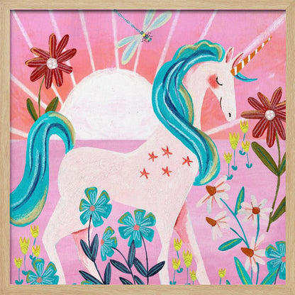 A whimsical painting of a serene white unicorn with a vibrant blue mane and tail, standing in a field of colorful flowers. The background features a large white sun against a pink sky with a dragonfly flying overhead. The artwork is presented in a light wood frame. Print