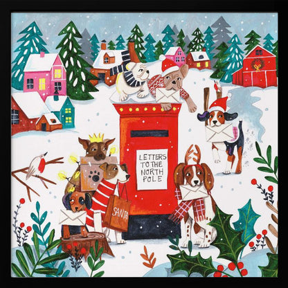 A whimsical Christmas illustration of several dogs in festive hats and scarves mailing letters at a bright red postbox labeled 'Letters to the North Pole' in a snowy village scene with colorful houses and pine trees. Decor