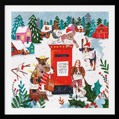 A whimsical Christmas illustration of several dogs in festive hats and scarves mailing letters at a bright red postbox labeled 'Letters to the North Pole' in a snowy village scene with colorful houses and pine trees. Decor