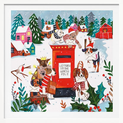 A whimsical Christmas illustration of several dogs in festive hats and scarves mailing letters at a bright red postbox labeled 'Letters to the North Pole' in a snowy village scene with colorful houses and pine trees. Decor