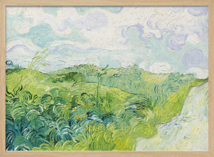 A framed art print of Vincent van Gogh's painting, 'Green Wheat Fields, Auvers'. It showcases a vibrant landscape of rolling green hills under a swirling blue and white sky, all rendered in his signature expressive, impasto brushwork. Print