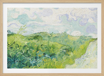 A framed art print of Vincent van Gogh's painting, 'Green Wheat Fields, Auvers'. It showcases a vibrant landscape of rolling green hills under a swirling blue and white sky, all rendered in his signature expressive, impasto brushwork. Print