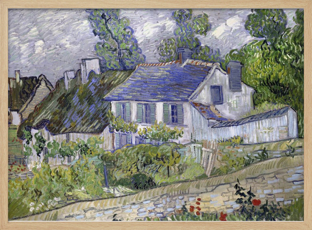 A post-impressionist painting by Vincent van Gogh depicting a quaint village scene. The artwork, characterized by thick, energetic brushstrokes, features houses with blue and thatched roofs, surrounded by lush green trees and foliage under a cloudy sky. The scene is framed in a simple silver border. Print