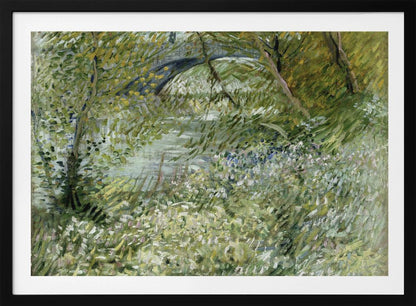 A framed impressionist painting by Vincent van Gogh, depicting the banks of a river. The scene is lush with green foliage and trees. In the foreground, white and blue flowers bloom in the tall grass. A bridge is partially visible in the background through the leaves. The brushwork is energetic and textured. Print