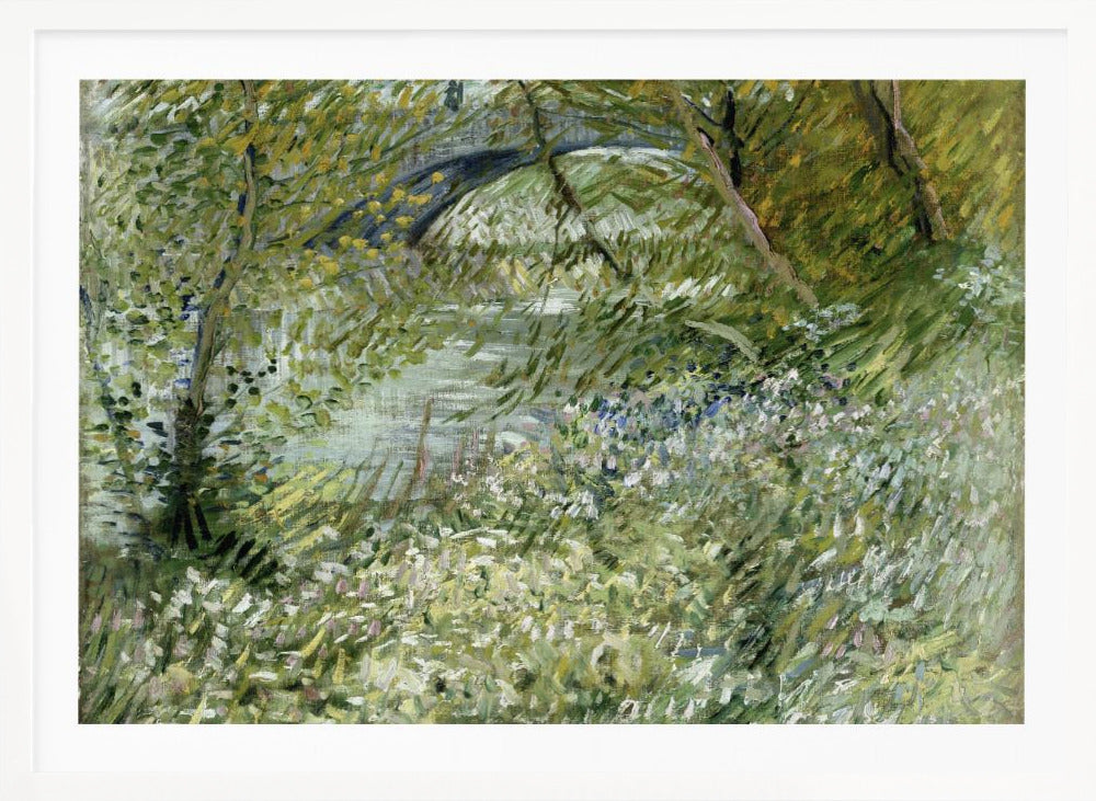 A framed impressionist painting by Vincent van Gogh, depicting the banks of a river. The scene is lush with green foliage and trees. In the foreground, white and blue flowers bloom in the tall grass. A bridge is partially visible in the background through the leaves. The brushwork is energetic and textured. Print