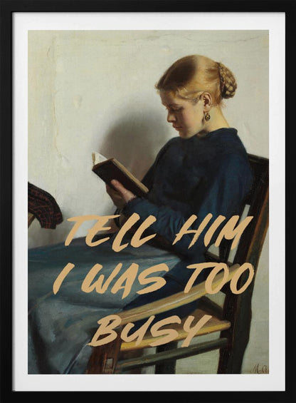 A classical painting of a woman in a blue dress sitting in a wooden chair, engrossed in reading a book. Overlaid in a modern, tan-colored brush script font is the phrase 'TELL HIM I WAS TOO BUSY'. Wall Art