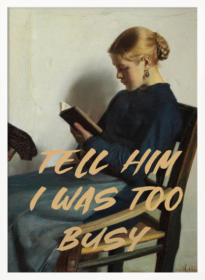 A classical painting of a woman in a blue dress sitting in a wooden chair, engrossed in reading a book. Overlaid in a modern, tan-colored brush script font is the phrase 'TELL HIM I WAS TOO BUSY'. Wall Art