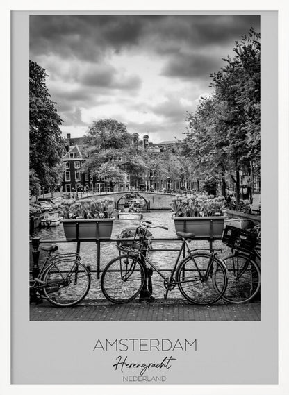 A black and white poster of the Herengracht canal in Amsterdam. In the foreground, two bicycles are parked by a railing with flower boxes. In the background, there's a classic view of the canal with a bridge, canal houses, and boats under a cloudy sky. The bottom of the poster has text that reads 'AMSTERDAM Herengracht NEDERLAND'. Decor