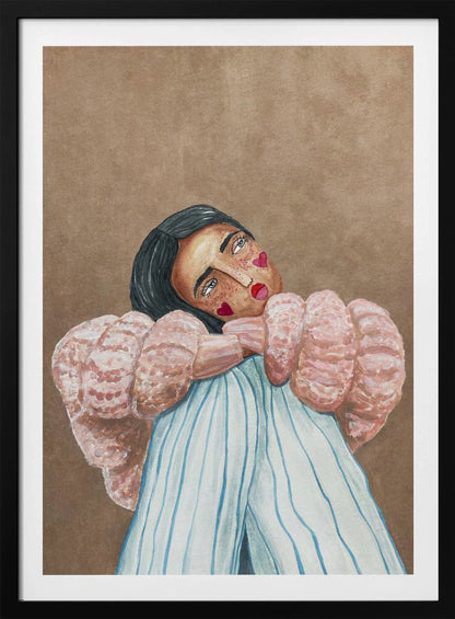 An illustrative painting of a person with dark hair, freckles, and red heart stickers on their cheeks. They are wearing a textured pink sweater and light blue pinstripe pants, hugging their knees while looking at the viewer with their head tilted against a solid brown background. Wall Art