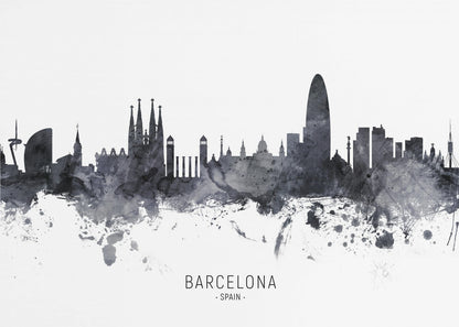 A framed black and white watercolor silhouette of the Barcelona, Spain skyline. Famous landmarks like the Sagrada Familia and Torre Glòries are visible. The word 'BARCELONA' is printed below the cityscape against a clean white background. Poster