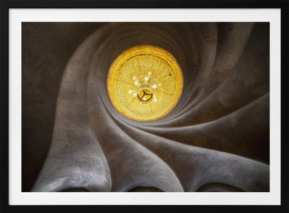 A worm's-eye view of an ornate, golden chandelier set against a swirling, textured dark grey ceiling. The spiraling architectural feature draws the eye to the brightly lit fixture, creating an abstract and dramatic composition. Poster