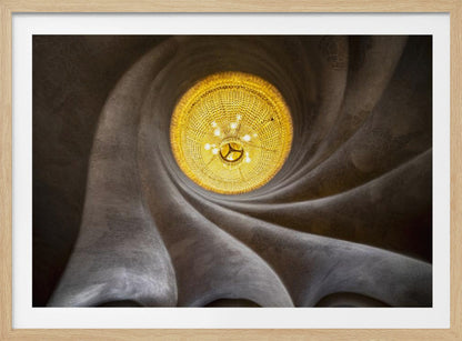 A worm's-eye view of an ornate, golden chandelier set against a swirling, textured dark grey ceiling. The spiraling architectural feature draws the eye to the brightly lit fixture, creating an abstract and dramatic composition. Poster