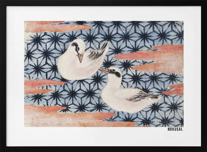 A classic Japanese woodblock print by Hokusai featuring two white birds with black eye markings resting on a background of a traditional blue Asanoha geometric pattern. Soft, reddish-orange cloud-like shapes float across the scene. Print