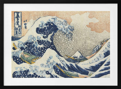 A framed print of Hokusai's 'The Great Wave off Kanagawa,' a Japanese ukiyo-e woodblock print. A huge, dark blue wave with white foam crests over small boats, with a snow-capped Mount Fuji in the distance under a pale orange sky. Artwork