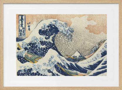 A framed print of Hokusai's 'The Great Wave off Kanagawa,' a Japanese ukiyo-e woodblock print. A huge, dark blue wave with white foam crests over small boats, with a snow-capped Mount Fuji in the distance under a pale orange sky. Artwork