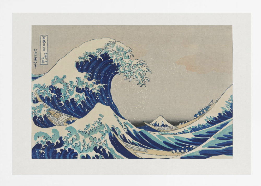The Great Wave off Kanagawa by Hokusai, a framed Japanese woodblock print depicting a giant, menacing blue and white wave cresting over three boats, with a small Mount Fuji visible in the background under a muted, overcast sky. Artwork