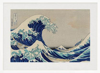 The Great Wave off Kanagawa by Hokusai, a framed Japanese woodblock print depicting a giant, menacing blue and white wave cresting over three boats, with a small Mount Fuji visible in the background under a muted, overcast sky. Artwork