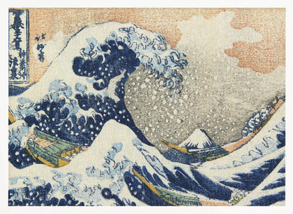 A framed reproduction of Hokusai's 'The Great Wave off Kanagawa,' depicting a massive, curling blue wave with white foam cresting over fishing boats. In the background, a small, snow-capped Mount Fuji stands under a pale orange and grey sky. Poster