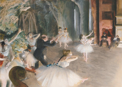 An impressionist painting depicting a ballet rehearsal on a stage. Ballerinas in white tutus practice and stretch while a male instructor in a dark suit directs them. The scene is viewed from the wings, with theatrical scenery in the background and onlookers seated to the right. Wall Art