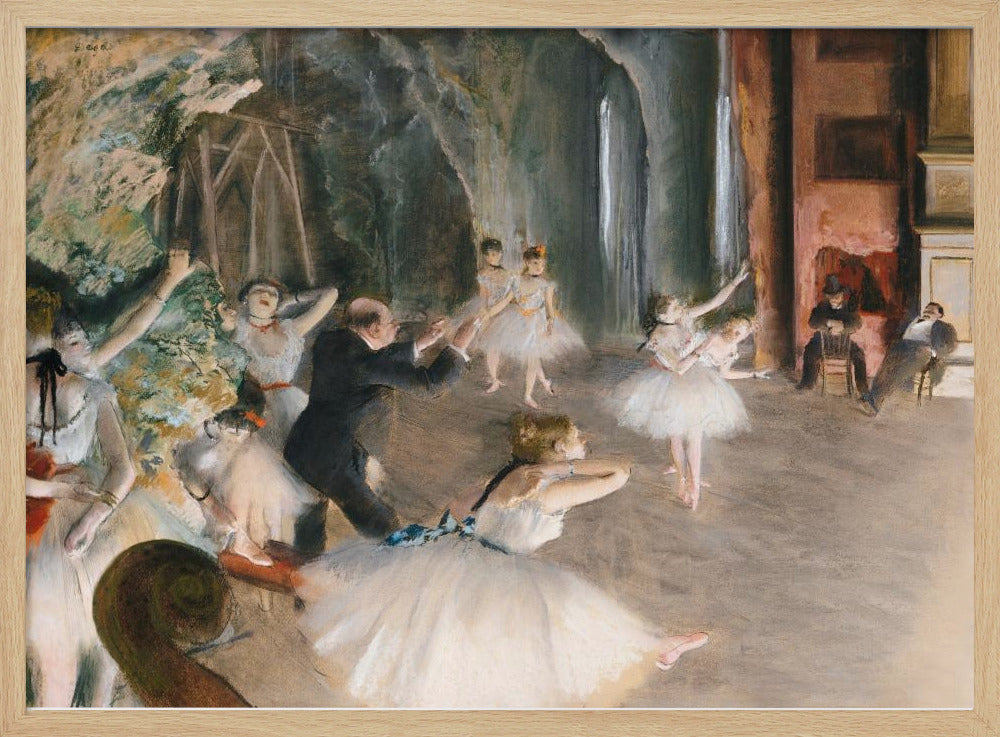 An impressionist painting depicting a ballet rehearsal on a stage. Ballerinas in white tutus practice and stretch while a male instructor in a dark suit directs them. The scene is viewed from the wings, with theatrical scenery in the background and onlookers seated to the right. Wall Art