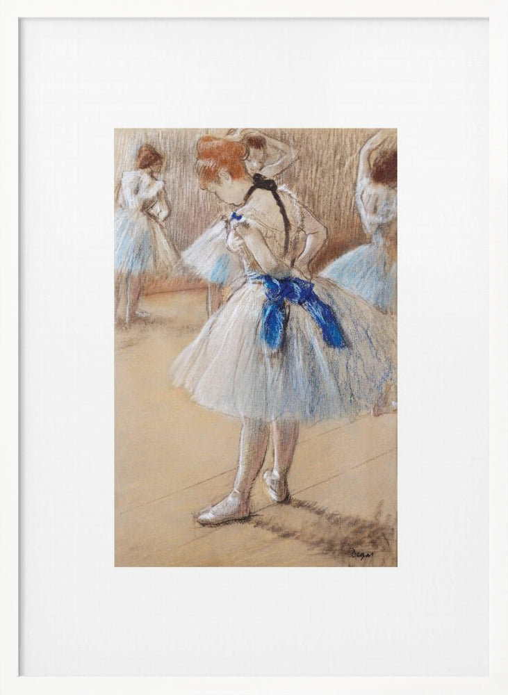 A framed print of an impressionist pastel drawing by Edgar Degas. It shows a ballerina in a white and light blue tutu with a prominent royal blue sash. She is viewed from the side as she adjusts her costume, with other dancers blurred in the background of a dance studio. Poster