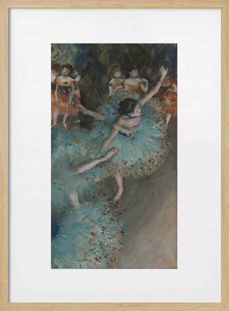 A framed art print of an impressionist painting depicting several ballet dancers on a stage. The central figure is a ballerina in a voluminous light blue tutu, viewed from a high angle. She is mid-pose with arms outstretched. Other dancers in orange and blue costumes are visible in the blurry background. Poster