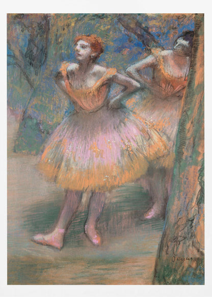 An impressionist pastel painting by Edgar Degas titled 'Dancers in Pink and Orange.' It depicts two ballerinas backstage. The dancer in the foreground has red hair, wears a pink and orange tutu, and stands with her hands on her hips, looking off to the side. A second dancer is partially visible behind her. The background is a textured blend of blues, greens, and browns. Artwork