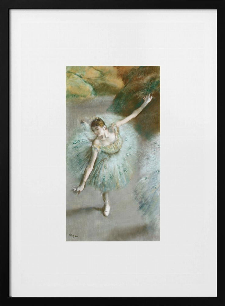 A framed vertical reproduction of an Edgar Degas painting showing a ballerina from a high angle. She wears a voluminous light blue tutu and is posed gracefully with arms outstretched against a soft, impressionistic background of earthy browns and tans. Poster