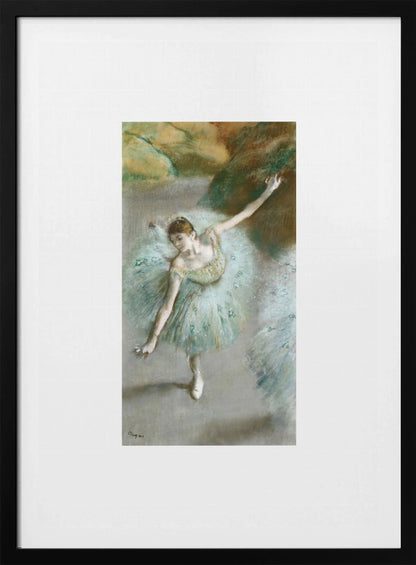 A framed vertical reproduction of an Edgar Degas painting showing a ballerina from a high angle. She wears a voluminous light blue tutu and is posed gracefully with arms outstretched against a soft, impressionistic background of earthy browns and tans. Poster