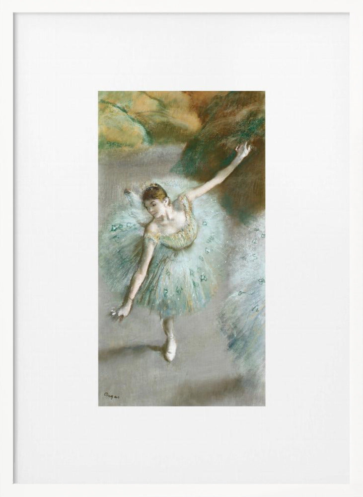 A framed vertical reproduction of an Edgar Degas painting showing a ballerina from a high angle. She wears a voluminous light blue tutu and is posed gracefully with arms outstretched against a soft, impressionistic background of earthy browns and tans. Poster