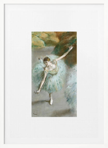A framed vertical reproduction of an Edgar Degas painting showing a ballerina from a high angle. She wears a voluminous light blue tutu and is posed gracefully with arms outstretched against a soft, impressionistic background of earthy browns and tans. Poster