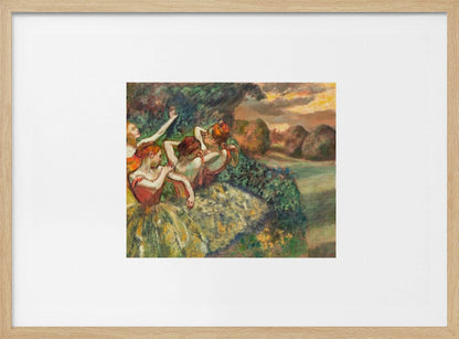 A framed print of Edgar Degas's Impressionist painting 'The Curtain Falls', featuring four ballet dancers in red bodices and green tutus. They are positioned amidst green scenery with a warm, sunset-lit landscape in the background. Artwork
