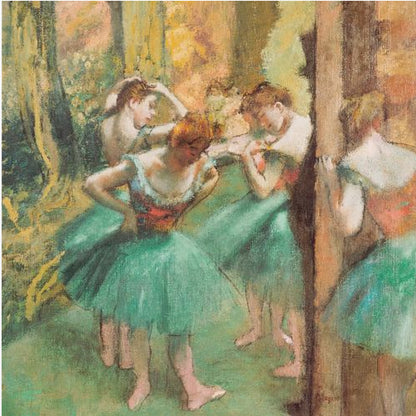An impressionist painting of four ballet dancers in green tutus backstage. The dancers are adjusting their costumes and hair against a warm, painterly background of yellow, orange, and brown tones. The artwork is displayed in a light wood frame. Wall Art