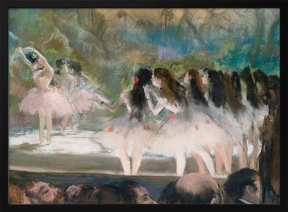 An impressionistic painting by Edgar Degas of a ballet performance, showing ballerinas in pink and white tutus on a stage with a lush backdrop, as seen from the perspective of the audience. The artwork is mounted in a silver frame. Artwork