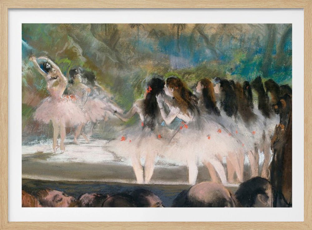 An impressionistic painting by Edgar Degas of a ballet performance, showing ballerinas in pink and white tutus on a stage with a lush backdrop, as seen from the perspective of the audience. The artwork is mounted in a silver frame. Artwork