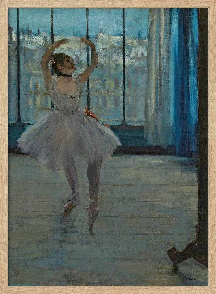An impressionistic painting by Edgar Degas of a ballerina in a dance studio. The dancer, wearing a white tutu and pointe shoes, stands in a graceful pose with her arms raised above her head. She is positioned in front of a large window that looks out onto a hazy cityscape under a blue sky. The room has a wooden floor and a deep blue curtain to the right. Poster