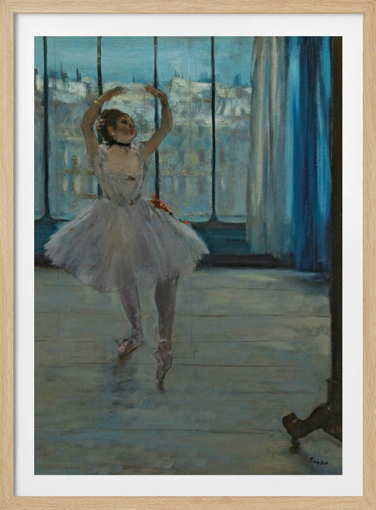 An impressionistic painting by Edgar Degas of a ballerina in a dance studio. The dancer, wearing a white tutu and pointe shoes, stands in a graceful pose with her arms raised above her head. She is positioned in front of a large window that looks out onto a hazy cityscape under a blue sky. The room has a wooden floor and a deep blue curtain to the right. Poster