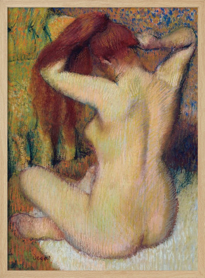 An impressionist pastel painting by Edgar Degas of a nude woman seen from the back. She is sitting on a light-colored surface, gathering her long, auburn hair with both hands behind her head. The background is a textured blend of green, yellow, and blue colors. Poster