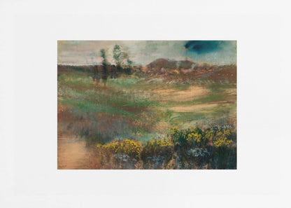 A framed impressionistic painting of a rolling landscape. In the foreground, there are bushes with yellow flowers. The midground features swaths of green and brown grasses, leading to a line of trees and hills in the background under a moody, overcast sky. The artwork is set in a white mat within a silver frame. Artwork