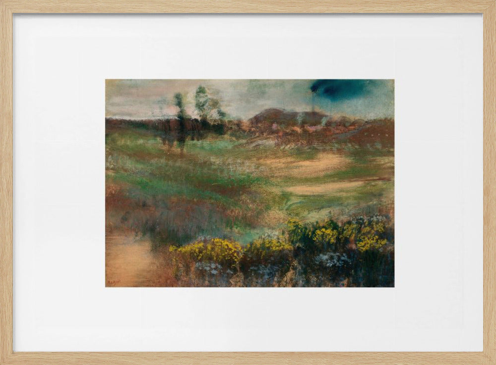 A framed impressionistic painting of a rolling landscape. In the foreground, there are bushes with yellow flowers. The midground features swaths of green and brown grasses, leading to a line of trees and hills in the background under a moody, overcast sky. The artwork is set in a white mat within a silver frame. Artwork