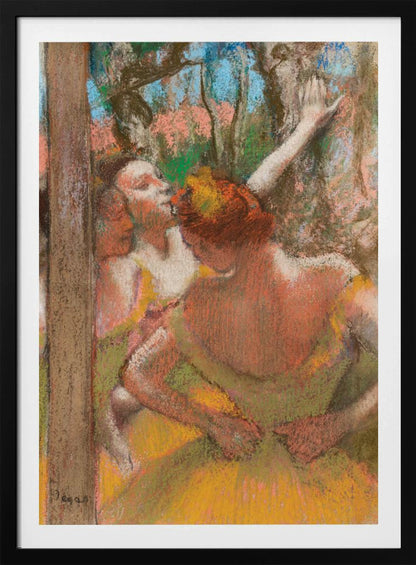 An Impressionist pastel drawing by Edgar Degas depicting several ballet dancers backstage. A dancer with reddish-orange hair is seen from behind in a yellow-green costume, while another dancer stretches an arm upwards. The background is a textured blend of blue, pink, and green. Decor