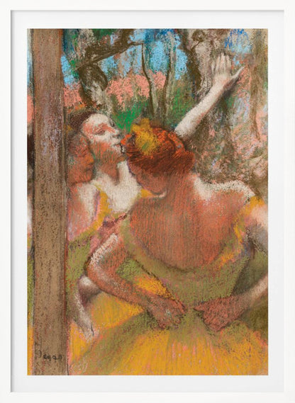 An Impressionist pastel drawing by Edgar Degas depicting several ballet dancers backstage. A dancer with reddish-orange hair is seen from behind in a yellow-green costume, while another dancer stretches an arm upwards. The background is a textured blend of blue, pink, and green. Decor