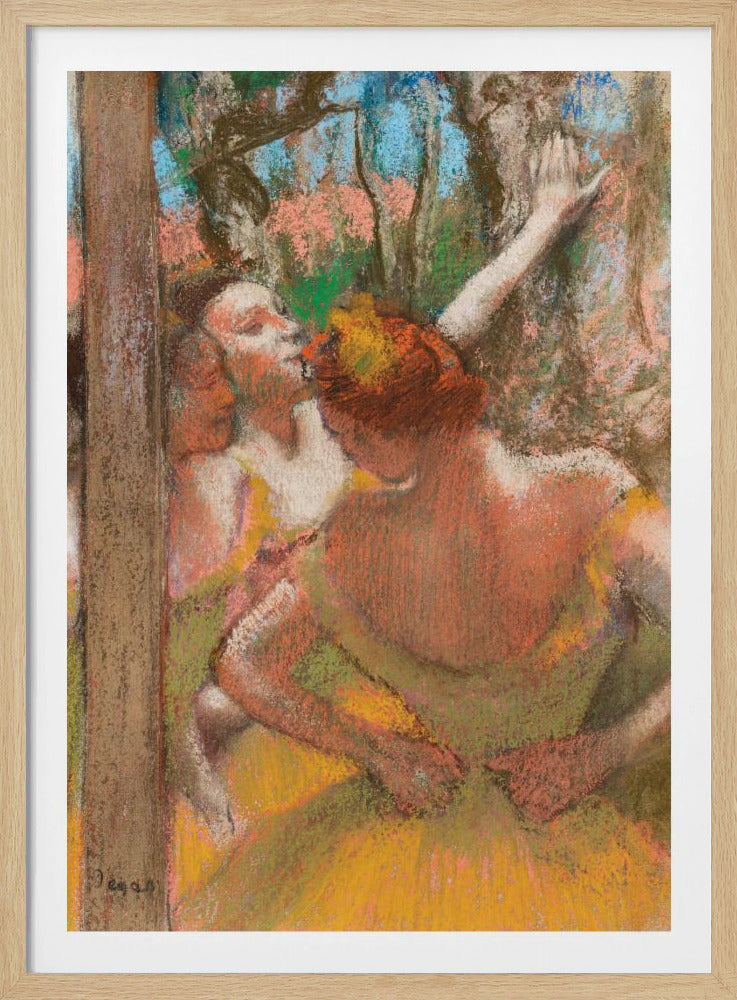 An Impressionist pastel drawing by Edgar Degas depicting several ballet dancers backstage. A dancer with reddish-orange hair is seen from behind in a yellow-green costume, while another dancer stretches an arm upwards. The background is a textured blend of blue, pink, and green. Decor