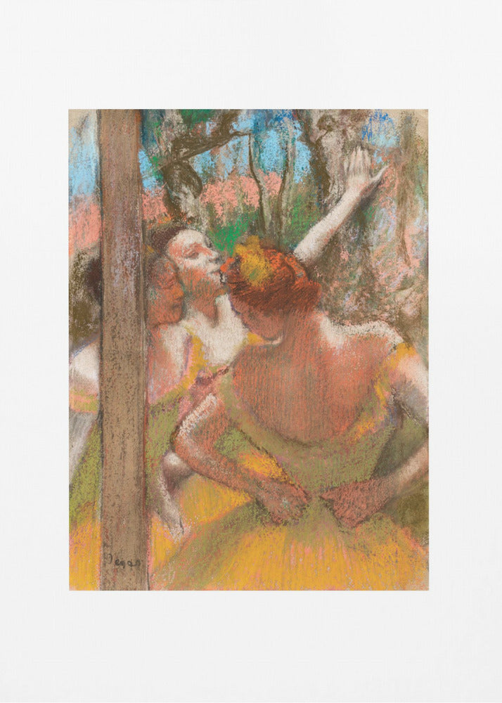 A framed art print of an impressionistic pastel painting by Edgar Degas featuring several ballet dancers backstage. A central figure, seen from behind, adjusts her yellow-green tutu while other dancers stretch in the background. Artwork