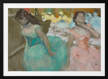 A framed pastel artwork by Edgar Degas depicting several ballerinas. In the foreground, a ballerina in a turquoise tutu looks down, while another in a pink tutu adjusts her collar with her eyes closed. In the background, more dancers in yellow and white are blurred on a stage. Wall Art
