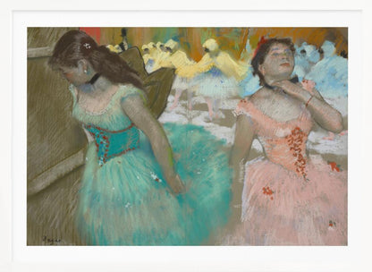 A framed pastel artwork by Edgar Degas depicting several ballerinas. In the foreground, a ballerina in a turquoise tutu looks down, while another in a pink tutu adjusts her collar with her eyes closed. In the background, more dancers in yellow and white are blurred on a stage. Wall Art