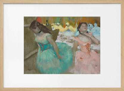 An impressionist pastel painting by Edgar Degas of two ballerinas backstage. One in the foreground wears a teal tutu and looks down, while another beside her in a pink tutu adjusts her choker. Other dancers are visible in the background under warm stage light. Poster