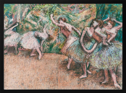 An Impressionist painting by Edgar Degas of ballet dancers on a stage against a green and orange backdrop. The dancers, in various poses, wear tutus in shades of white, pink, and light green. The artwork is framed in a simple silver frame. Artwork