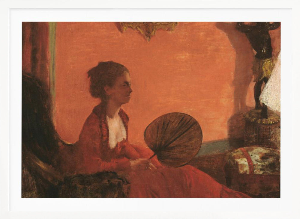 A vintage painting of a woman in profile sitting in a chair against a warm, orange-toned wall. She is wearing a red dress with a white ruffled collar and holding a dark, circular fan in her lap. The room is softly lit, with shadows and a small statue visible in the background. Wall Art