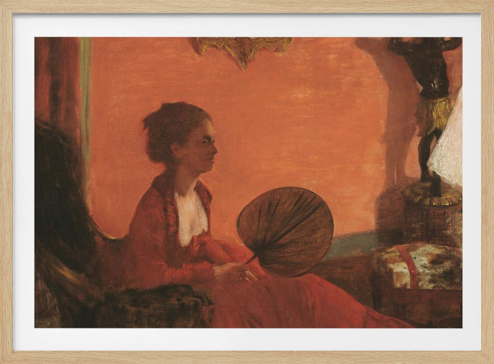 A vintage painting of a woman in profile sitting in a chair against a warm, orange-toned wall. She is wearing a red dress with a white ruffled collar and holding a dark, circular fan in her lap. The room is softly lit, with shadows and a small statue visible in the background. Wall Art